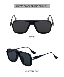 Macro view of matte black square sunglasses with metallic hollowed-out temples and gray lenses