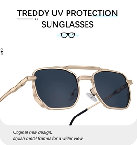 Detail of champagne gold square metal frame with double bridge design and dark grey lenses
