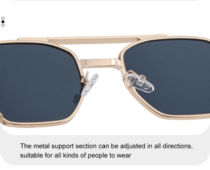 Detail of adjustable metal nose pads on square frame sunglasses for comfort and fit