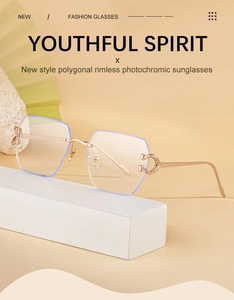 Macro detail of rimless gradient sunglasses with rose gold hinges and diamond accents
