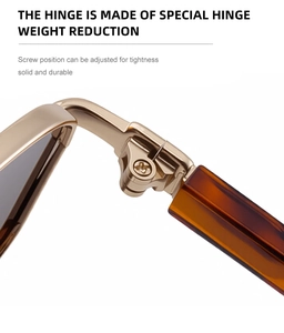 Detail of golden metal hinge and tortoiseshell temple on square frame sunglasses