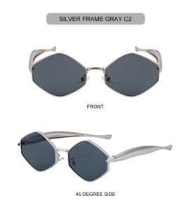 Détail de lunettes de soleil polygonales argentées avec verres gris et branches larges