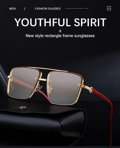 Detail of square gold metal sunglasses with wood grain temples on premium leather case