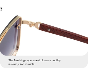 Detail of durable gold metal hinge and wood grain temples on square sunglasses