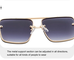Close-up of adjustable nose pads and gold double bridge on square frame sunglasses