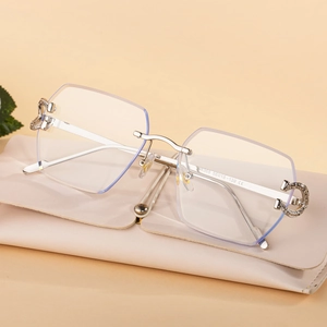 Chic rimless photochromic sunglasses with silver C-decor metal frame for women