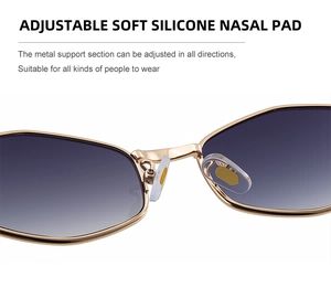 Macro detail of adjustable soft silicone nose pads on gold metal polygon sunglasses