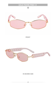 Detail of polygonal gold frame sunglasses with pink lenses and quilted temple texture