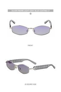 Detail of silver geometric sunglasses with light blue gradient lenses and embossed temples