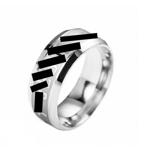 Modern silver stainless steel ring with matte finish and JUST engraving from a 45-degree angle