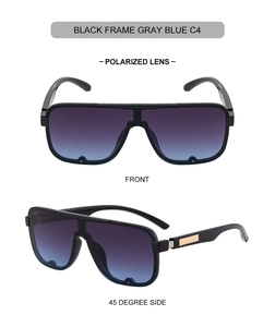 Detail view of square polarized sunglasses with grey-blue gradient lens and gold trim