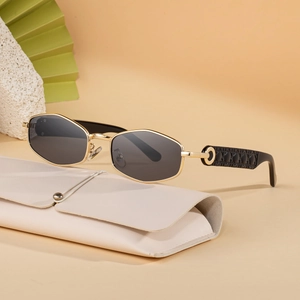 2025 polygon gold metal frame sunglasses with dark grey lenses and a white leather pouch