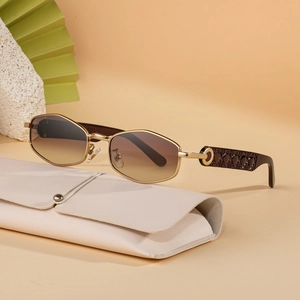 Polygon narrow sunglasses with gradient brown lenses and golden floral engraved frames