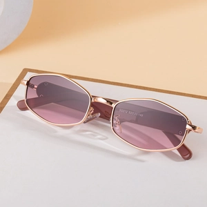 Modern polygon metal sunglasses with rose gold frame and pink gradient lenses for women