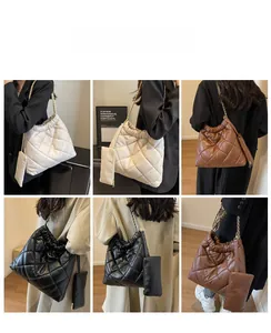 Quilted tote bag detail with chain strap and matching coin purse in multiple colors