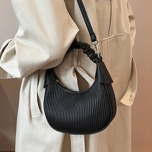 Black crescent hobo bag for women with pleated texture and stylish shoulder strap