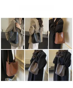 Detailed shots of crocodile pattern bucket bags in black, brown, and dark coffee colors