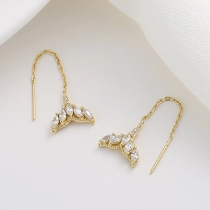 Elegant gold mermaid tail threader earrings with shimmering white zircon stones