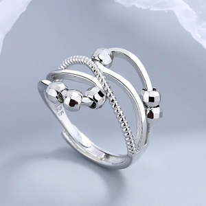 Adjustable S925 sterling silver spinning bead ring with a triple-layered geometric design