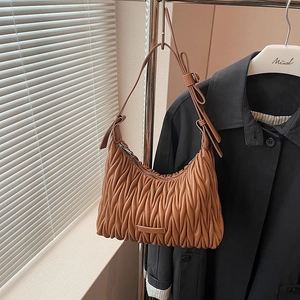 Brown pleated hobo bucket bag in soft faux leather with silver zipper for women