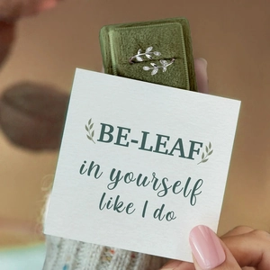 Silver leaf ring with pavé crystals in green velvet box with an inspirational card