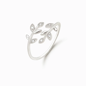 Detailed view of silver leaf ring with pavé crystals and intricate beaded edge accents