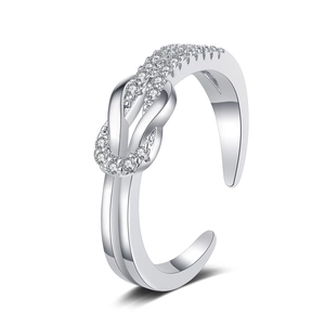 Silver open ring with a crossed knot design and pave-set sparkling zircons for women