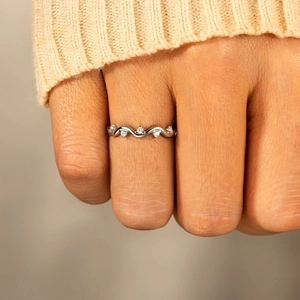 Minimalist wavy silver ring featuring five sparkling round-cut cubic zirconia for women