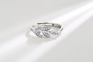 Detailed view of leaf silver ring with sparkling marquise-cut cubic zirconia crystals