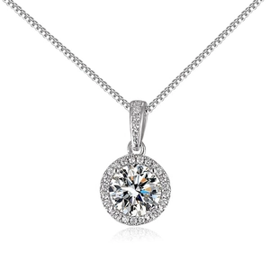 Macro shot of silver halo necklace featuring a brilliant round-cut central crystal pendant
