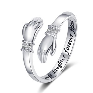Adjustable hugging hands ring with zircon accents and sentimental interior engraving