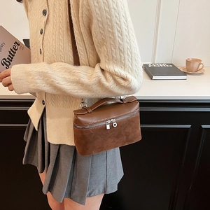 Brown leather拼接 box shoulder bag with top handle and silver zipper closure for women