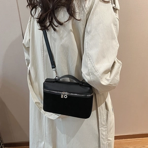 Classic black rectangular leather shoulder bag with top handle and silver lock details