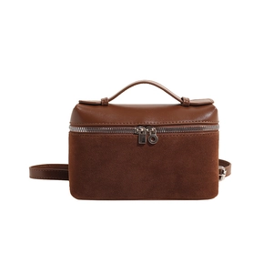 Minimalist chocolate brown leather crossbody bag with top handle and double zippers
