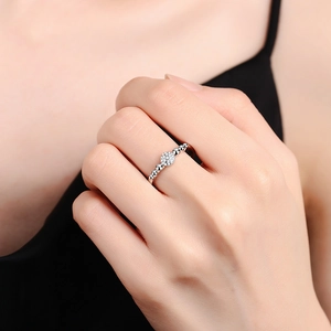 Elegant silver bubble ring with zircon cluster crystals shown on finger