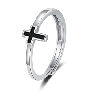 Detailed close-up of a silver adjustable ring featuring a black cross design on white back