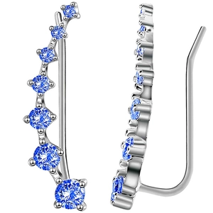 Detailed view of silver ear crawlers with seven gradient blue cubic zirconia stones