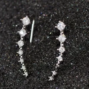 Macro detail of curved ear crawlers with seven graduated cubic zirconia stones