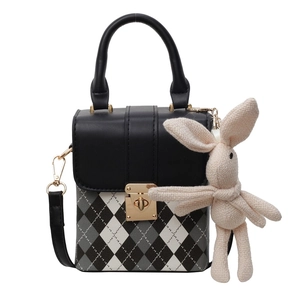 Chic quilted crossbody phone bag in tricolor pattern with cute rabbit keychain accessory