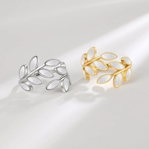 Elegant adjustable leaf open rings in gold and silver finish with pearl-like inlay