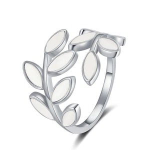 Minimalist adjustable leaf ring with white enamel accents on a clean white background