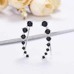 Elegant curved silver stud earrings with eight graduated black cubic zirconia stones
