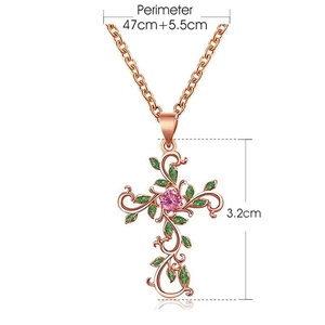 Detailed view of leaf cross necklace pendant with dimensions 47cm length and 3.2cm height