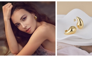 Detail view of gold hollow teardrop earrings showing side profile on model and mirror finish