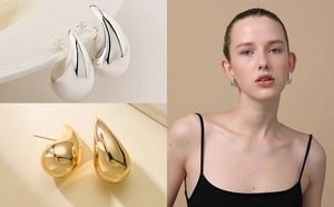 Polished hollow teardrop earrings in gold and silver finish shown on a model