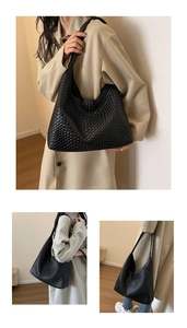 Detailed view of black woven faux leather Hobo shoulder bag with Intrecciato pattern