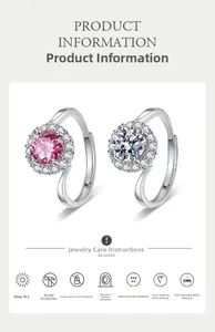 Detail of adjustable moissanite rings in pink and white with jewelry care instructions
