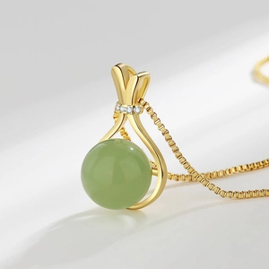 Lucky bag pendant necklace with green jade bead and zircon in gold-plated finish
