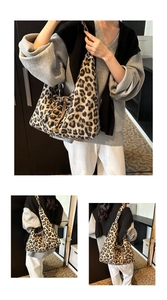 Detail of leopard print plush tote bag with drawstring bow and gold metal charm