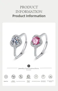 Detail of adjustable heart halo rings with white and pink stones and diamond pavé